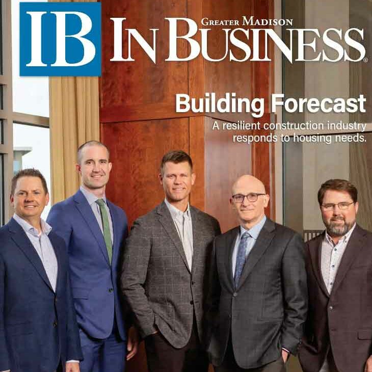 Cover of In Business magazine showing five men in sportcoats