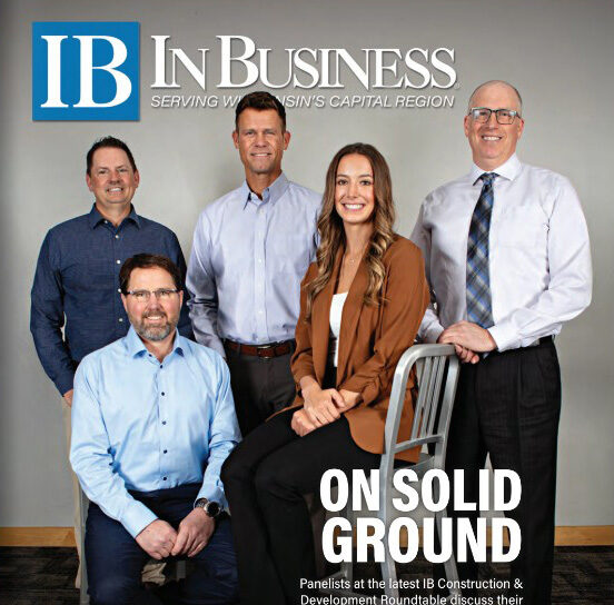 Four men and a woman on the cover of IB Magazine